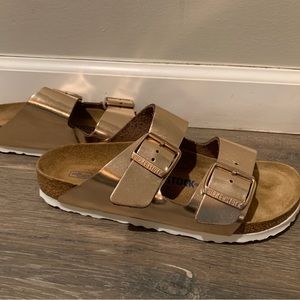 Women’s Birkenstock Metallic Copper Arizona sandal.
